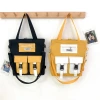 2021 new single-shoulder crossbody double-back large-capacity student tutoring canvas bag, double-pocket mobile phone, loose change bag, women's bag Specification image